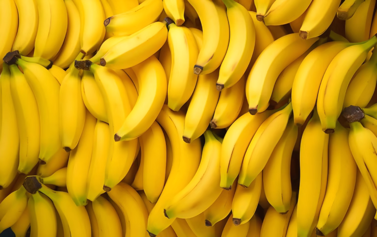 Health Benefits of Bananas – A Nutritious Fruit Fresh ripe bananas rich in potassium and fiber, a healthy fruit that supports digestion, heart health, and energy levels.